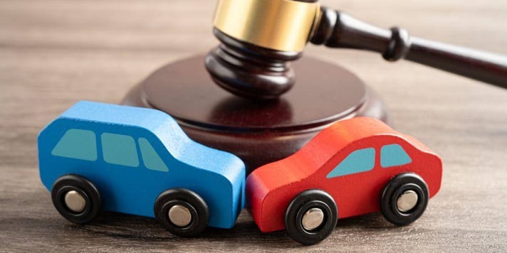 Gavel-and-Play-Vehicles-Reenacting-a-Traffic-Collision