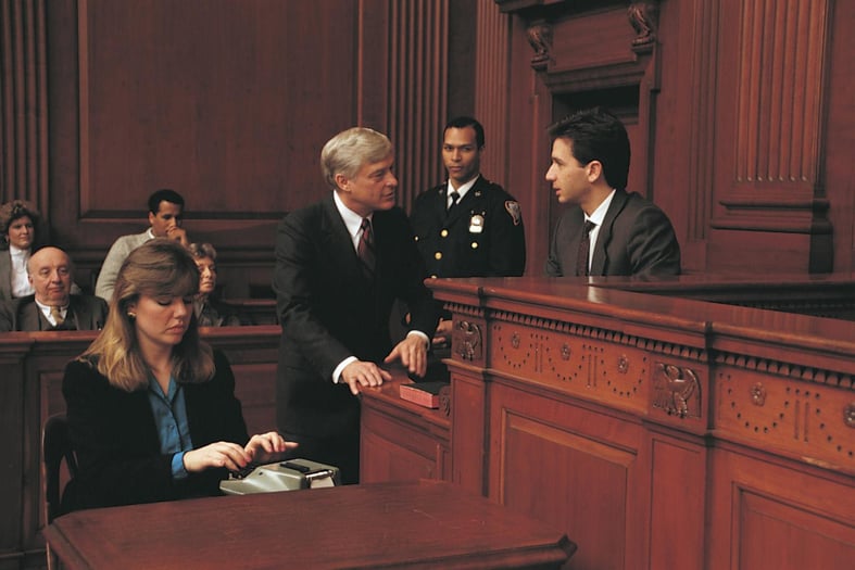 An attorney discussing a case with a judge in Woodstock