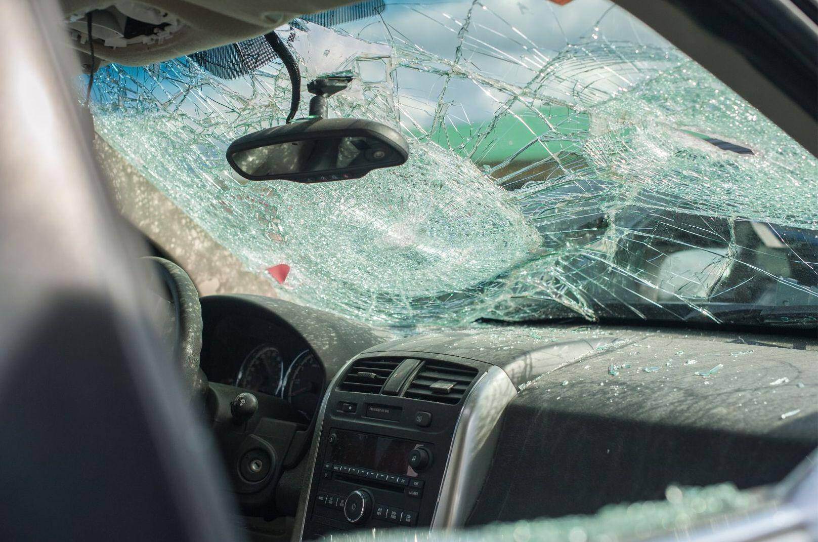 A shattered windshield that was destroyed in a truck accident in Acworth, Georgia