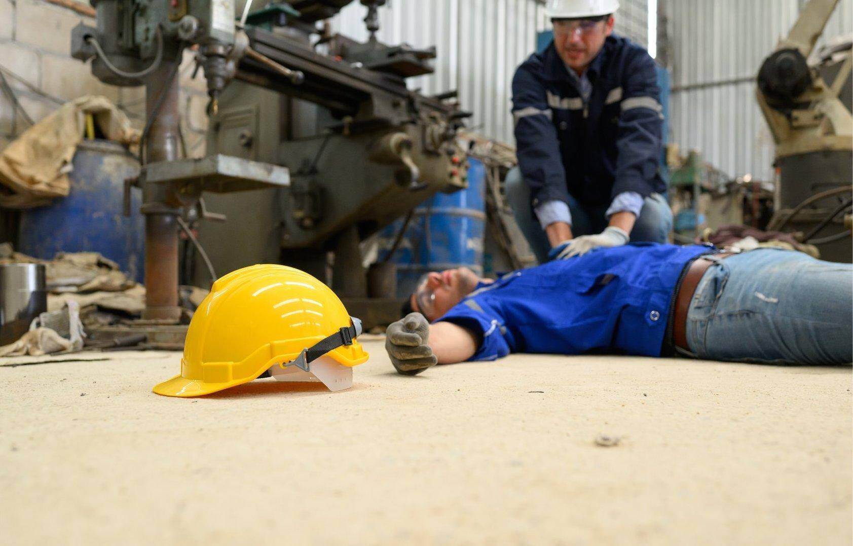 An unconscious man who has been injured on the job who will file for workers compensation in Belvedere Park, Georgia