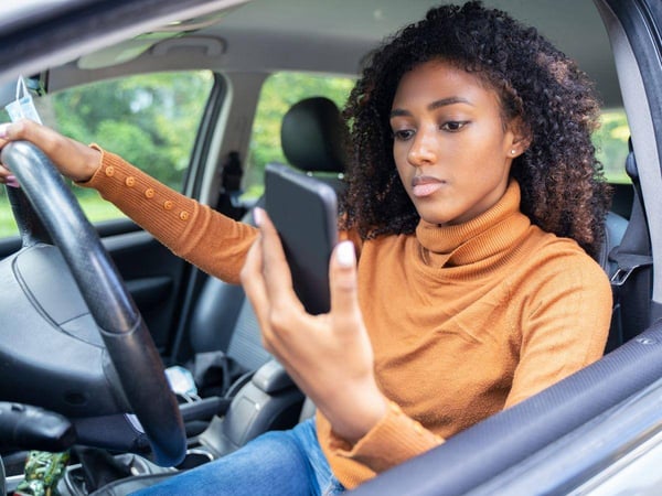 A-Woman-in-Atlanta-Texting-While-Driving