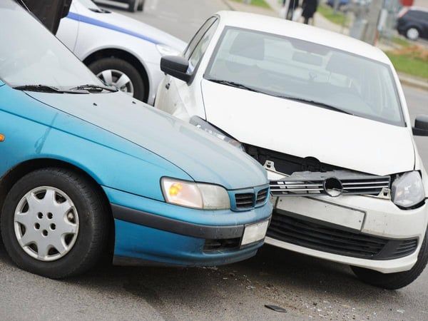 Silver-Vehicle-Crashing-into-a-Teal-Vehicle-in-Atlanta