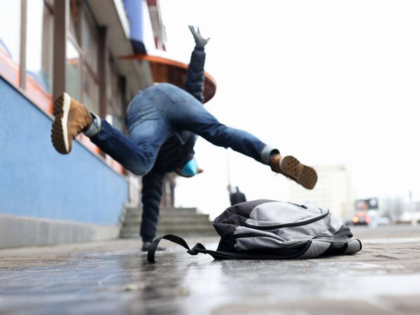 Man-in-Atlanta-Slips-on-Wet-Pavement